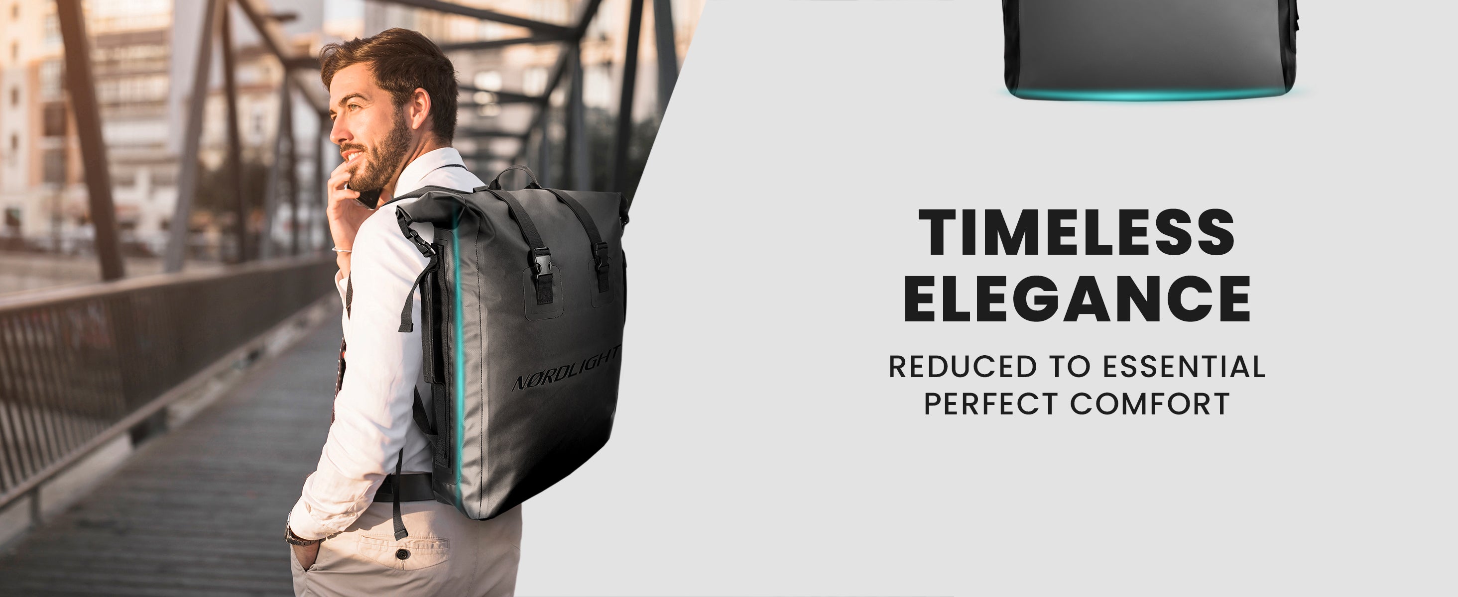 Bearded man with grey Nordlight backpack stands on a bridge overlooking a city skyline, showcasing sleek design.